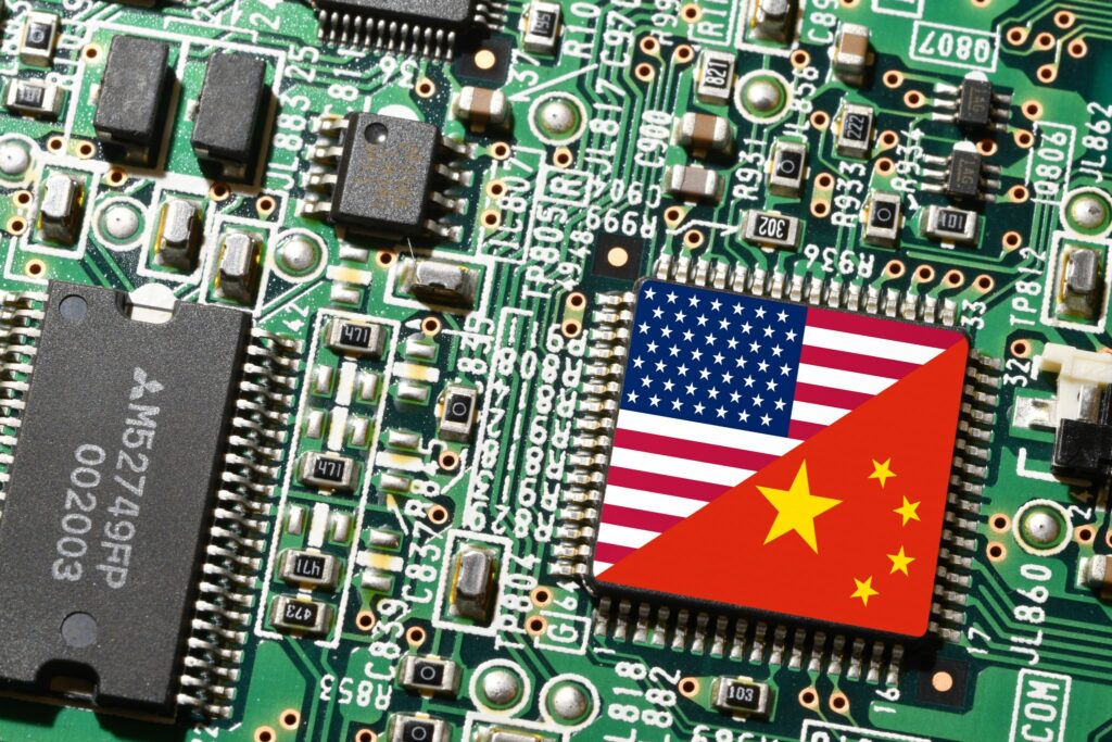 Semiconductor chip with a flag of China and US on it.